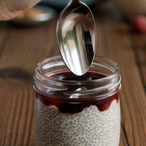 Coconut Cream Chia Custard with Warm Berry Reduction